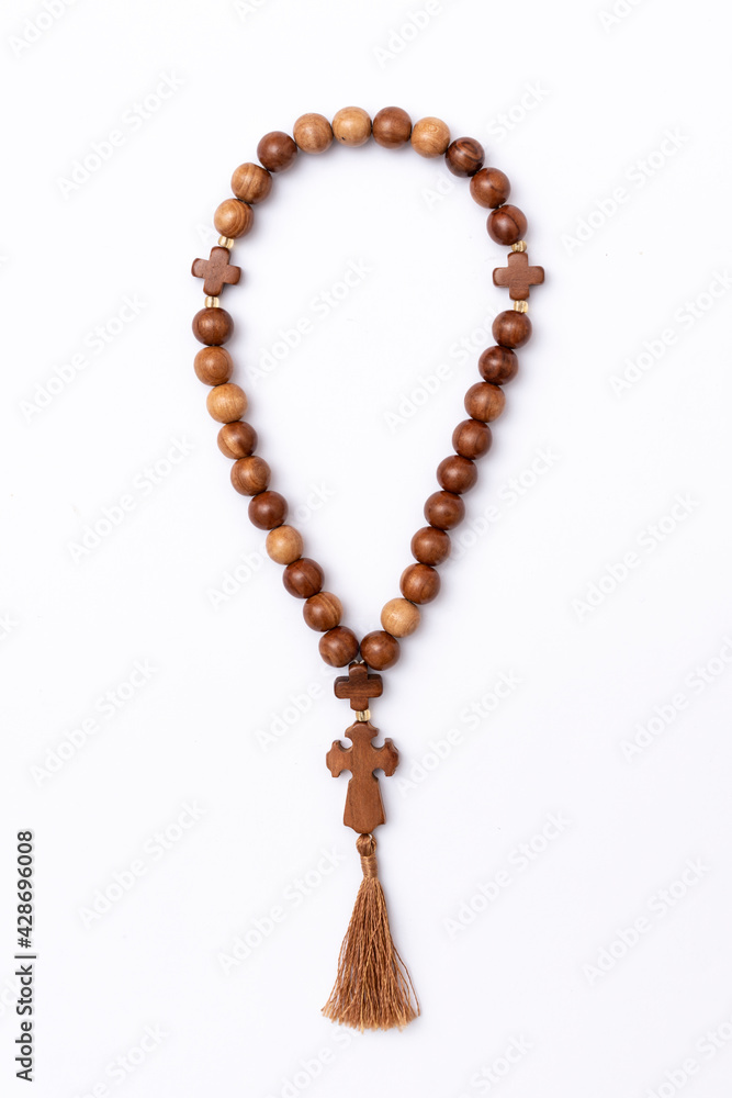 Christian prayer rosary beads isolated on white background. Christian prayer rosary beads isolated on white background.
