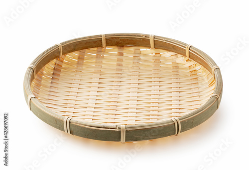 Bamboo basket placed on a white background photo