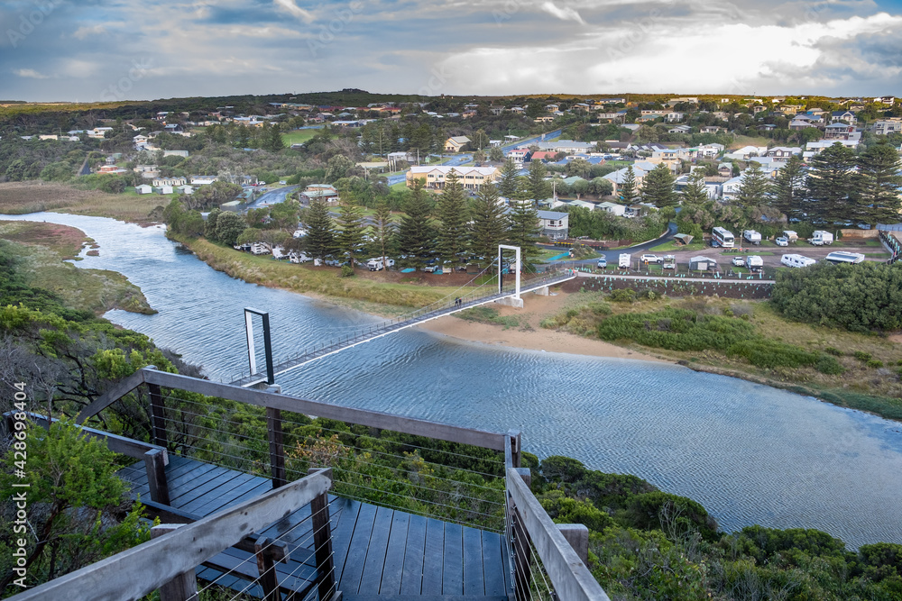 Scenic view of the Port Campbell Creek Pedestrian Bridge and the township in Victoria, Australia