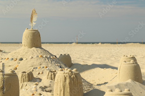 Castel of sand at the beach in holiday, horizont photo