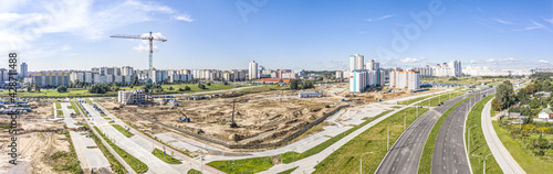 construction of new apartment buildings and roads in new residential district. panoramic aerial view