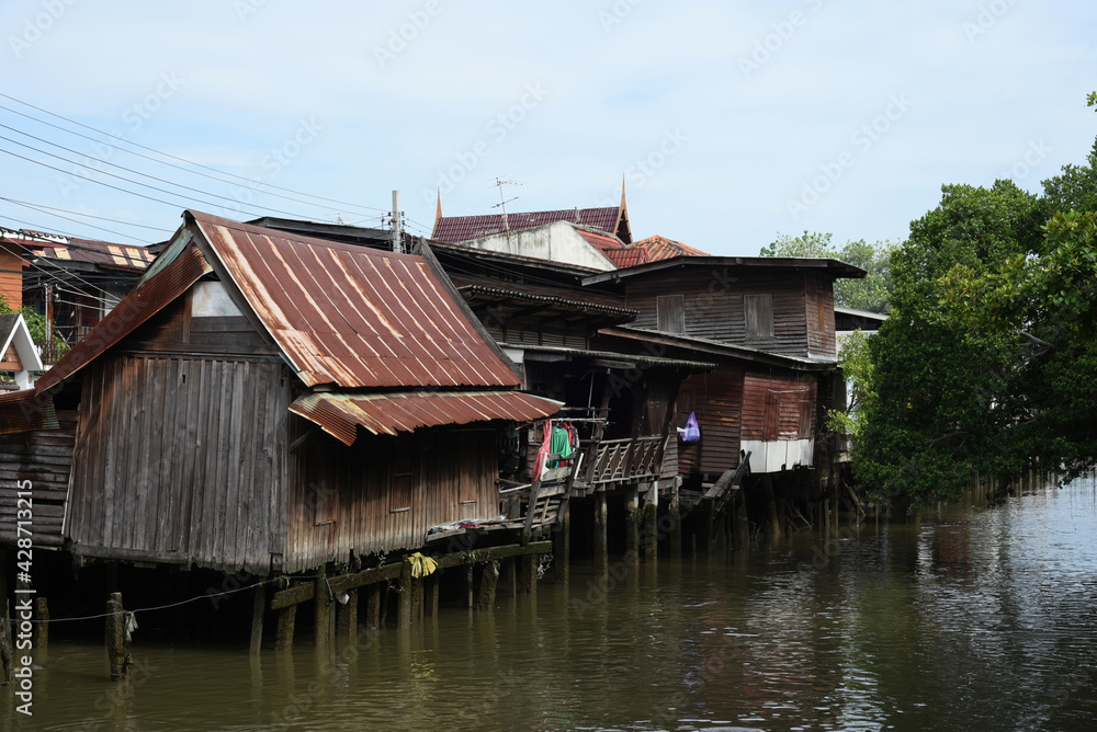 Old wood house in the countryside at Samut-prakan of Thailand.