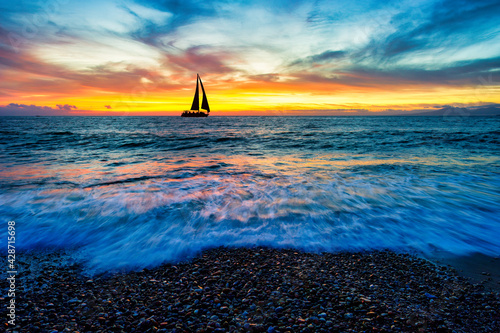 Sunset Ocean Sailboat