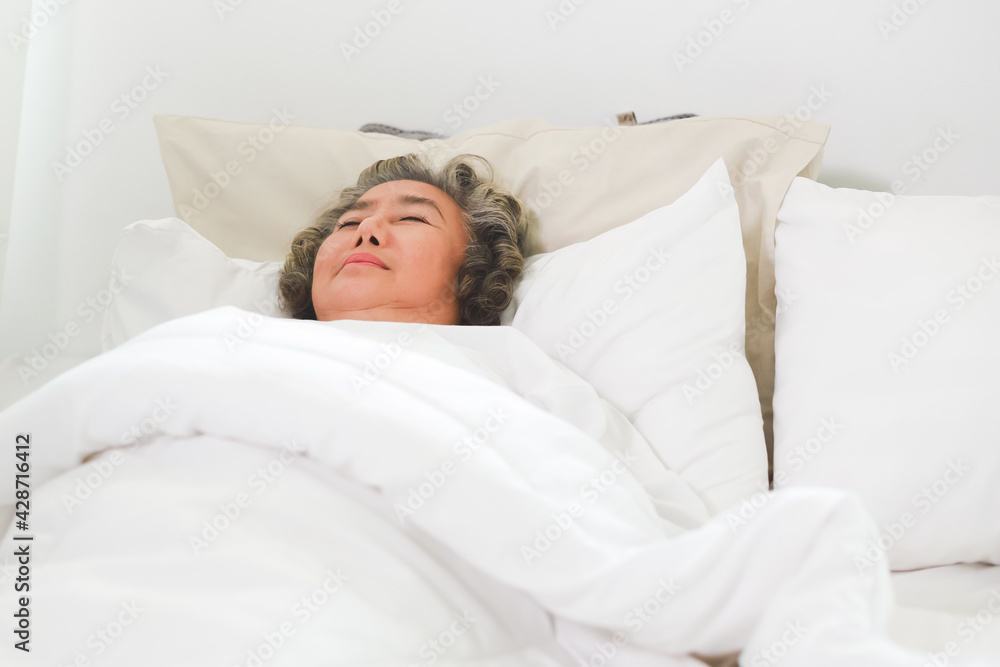 Asian Elderly woman sleep and sweet dream on bed. Asian Elderly woman sleep and sweet dream on bed.
