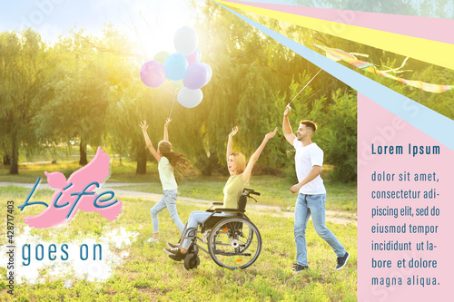 Happy woman in wheelchair a...