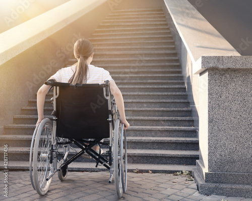 Young woman in wheelchair n...