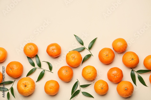 Konstfotografi Composition with sweet tangerines and leaves on color background