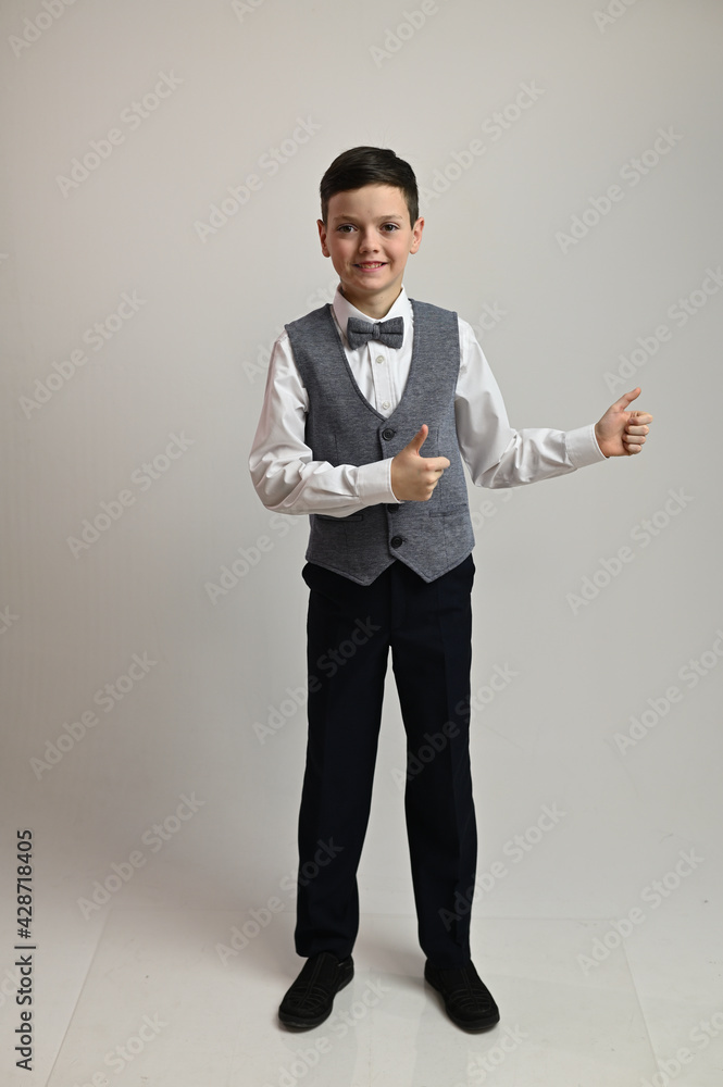 Full-length portrait of an artistic Caucasian teenager on a white background Full-length portrait of an artistic Caucasian teenager on a white background