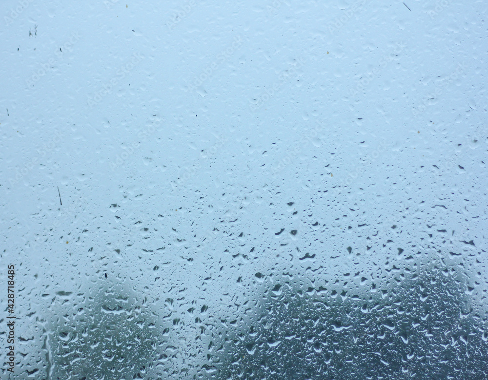 The rain drop water on window glass The rain drop water on window glass