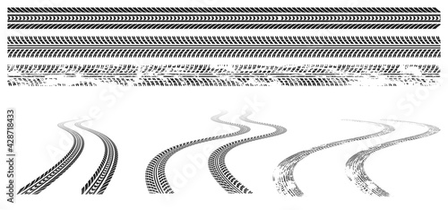 Black car tire tracks, rubber wheel print on road or dirt. Grunge winding trace from vehicle tires isolated on white background. Vector graphic set of tread marks in top and perspective view photo