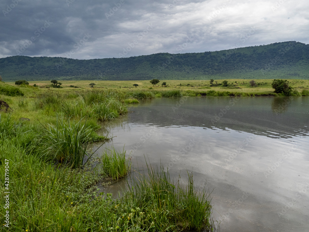 Ngorongoro Crater, Tanzania, Africa - March 1, 2020: Calm lake in Ngorongoro Crater