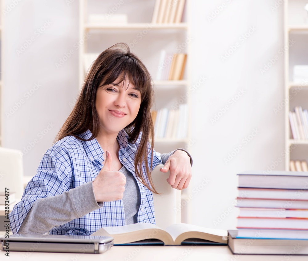 Young female student in educational concept Young female student in educational concept