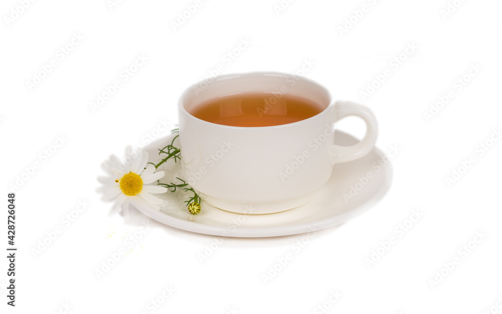 herbal chamomile tea in white porcelain cup on white background herbal chamomile tea in white porcelain cup on white background