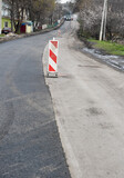 repair of an asphalt road with fresh asphalt