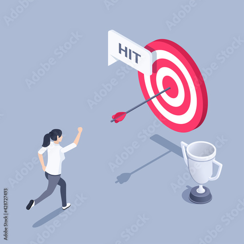 isometric vector illustration on gray background, woman happily runs up to the target with an arrow in the center and the winner's cup, hit the target