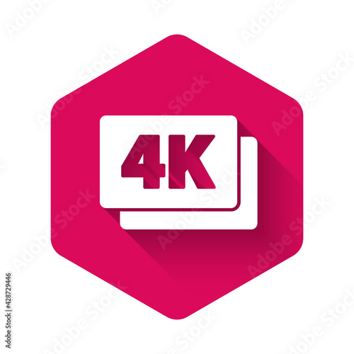 White 4k Ultra HD icon isolated with long shadow. Pink hexagon button. Vector