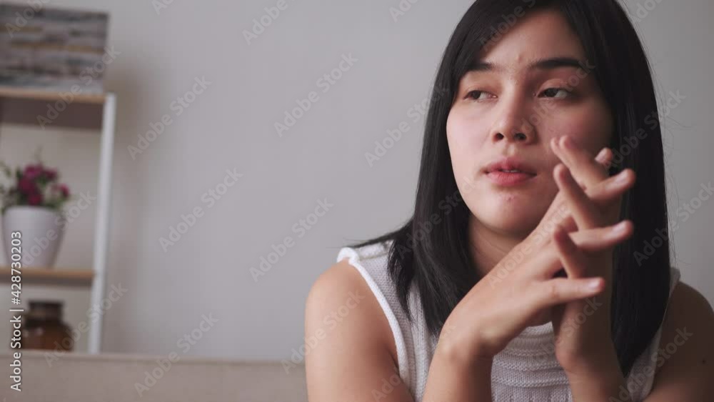 Attractive Asian woman is sad worried for problem feeling stress, upset frustrated lonely. 4K Attractive Asian woman is sad worried for problem feeling stress, upset frustrated lonely. 4K