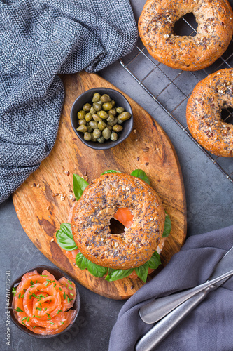 Bagels with cream cheese and salmon. Plating, fast lunch, meal.  photo