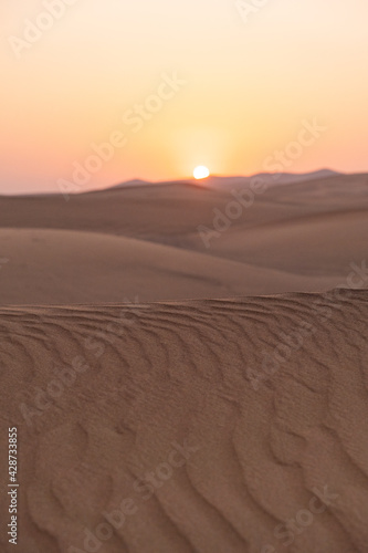 Landscape of desert dunes at sunset © Aleksandr