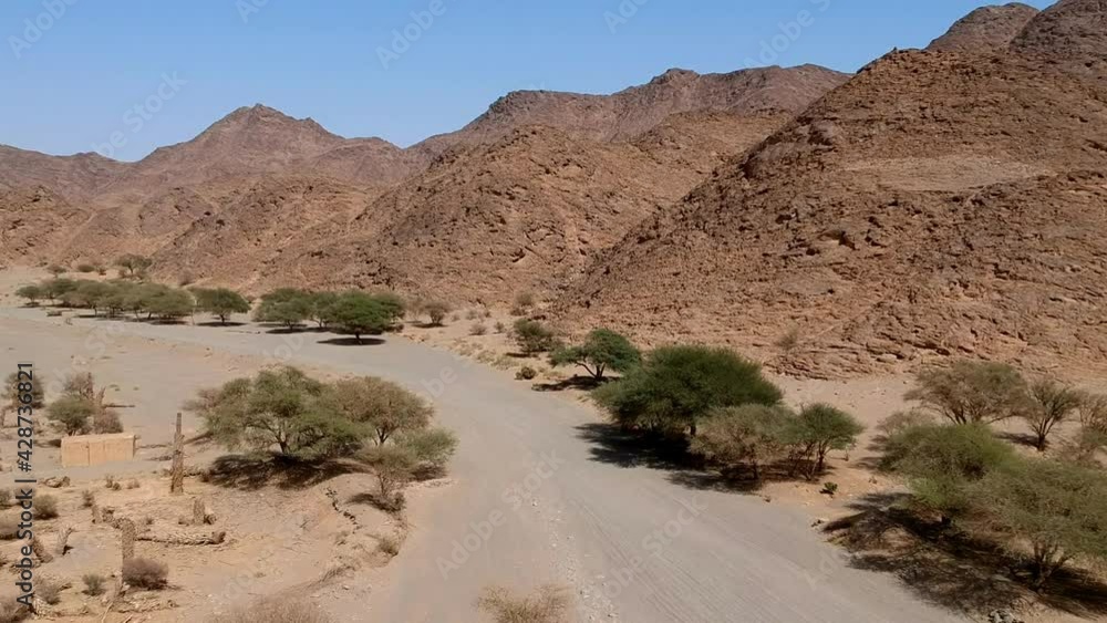 Aerial view from a drone flying over the north entrance of Wadi Massal, an archeological site in Saudi Arabia Aerial view from a drone flying over the north entrance of Wadi Massal, an archeological site in Saudi Arabia