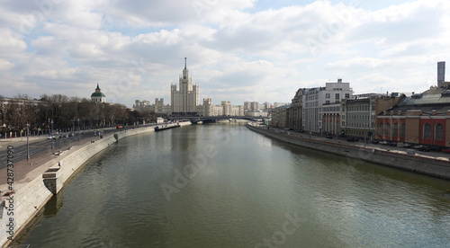View of the Moscow River and the high-rise on the Kotelnicheskaya Embankment, Big Ustyinsky bridge in spring