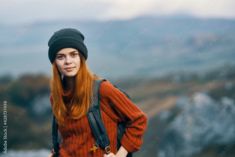 woman hiker with backpack smile landscape mountains travel