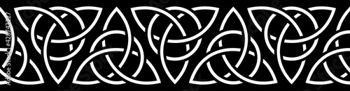 Celtic border. Traditional celtic ornament with medieval trinity symbol. Repeat seamless pattern for frame borders. Black and white design. Vector illustration