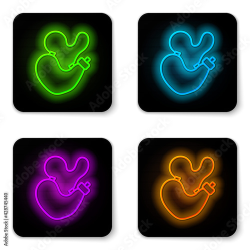 Glowing neon line Spanish wineskin icon isolated on white background. Black square button. Vector