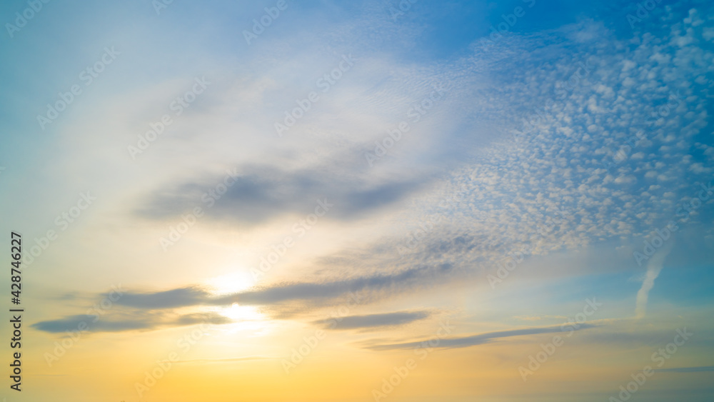 Beautiful textured sky with clouds at sunset Beautiful textured sky with clouds at sunset
