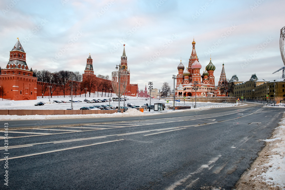 View of Vasilievsky Spusk, Red Square, St. Basil's Cathedral and the Spasskaya Tower of the Moscow Kremlin on a frosty winter morning