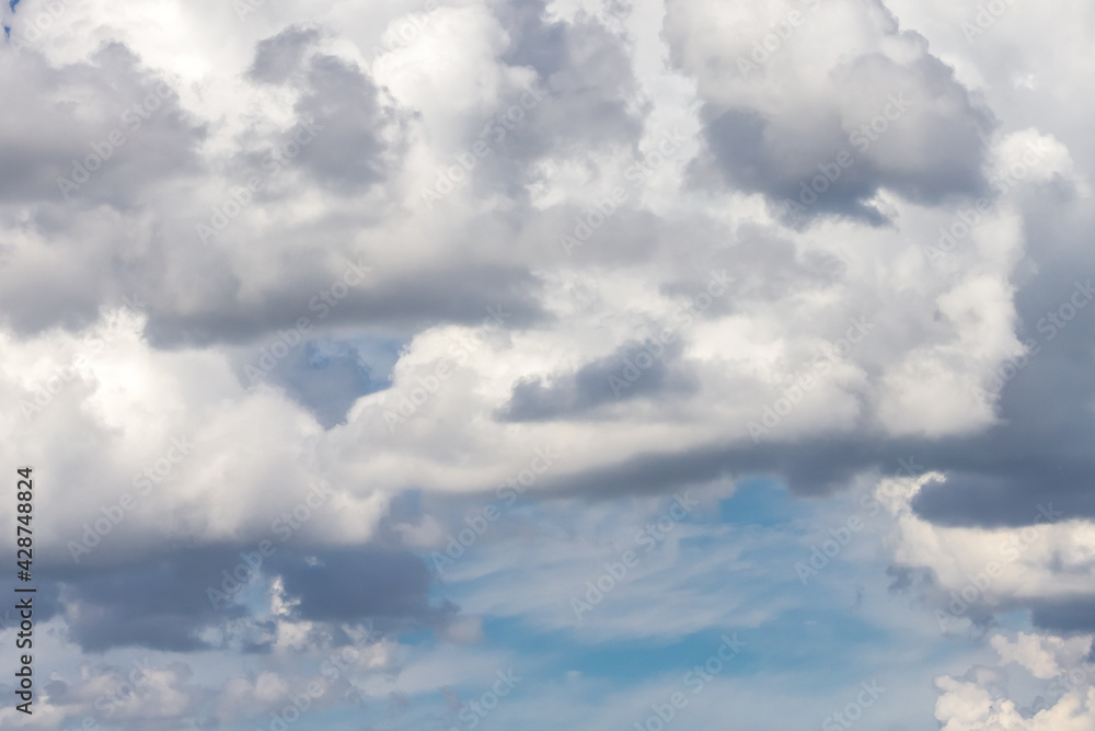 Blue sky background with white cumulus fluffy clouds. Blue sky background with white cumulus fluffy clouds.