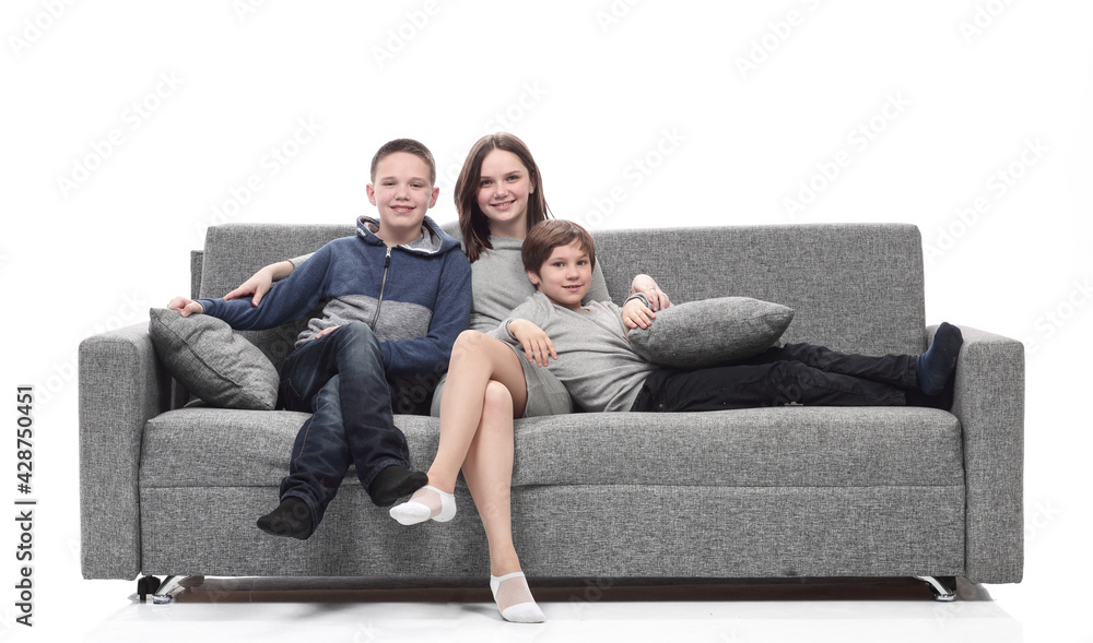 happy family sitting on a large comfortable sofa.