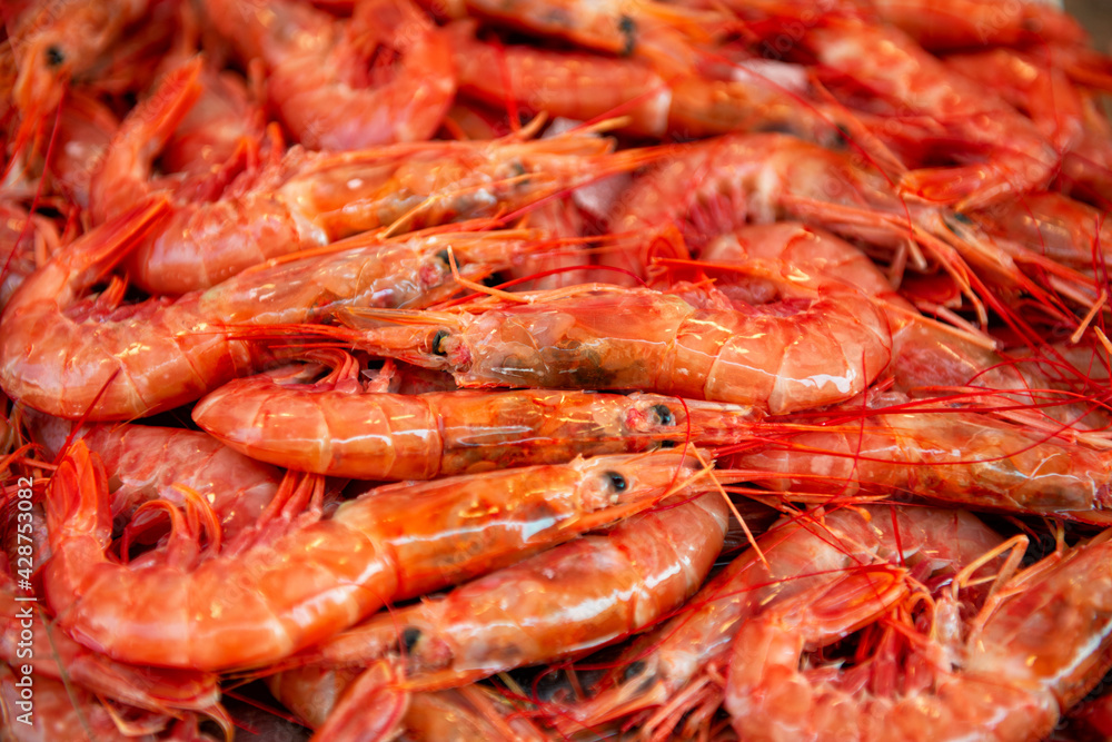 large boiled red prawns sold on outdoor italian market in Sicily large boiled red prawns sold on outdoor italian market in Sicily