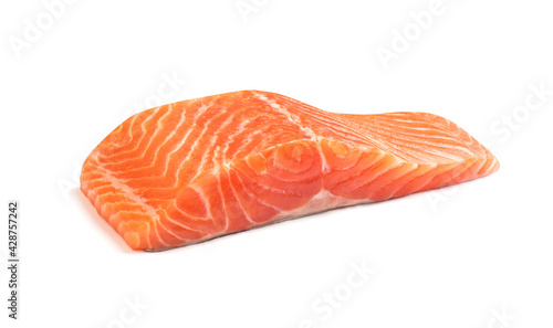 One fillet of red fish on a white background