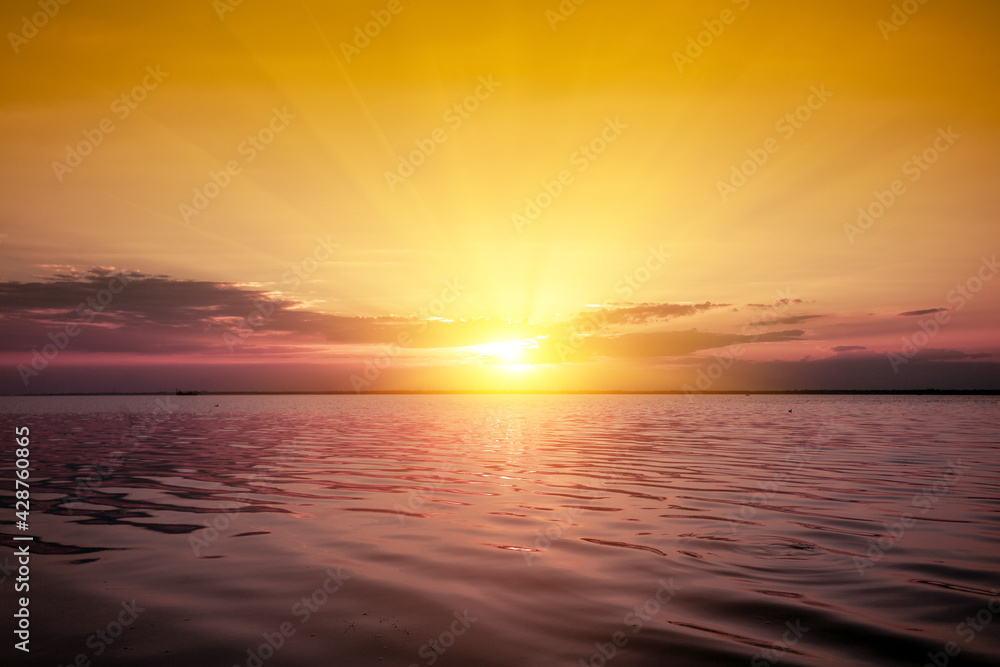 Seascape in the eveninig. Golden sunset over the sea. Gradient color. Nature landscape