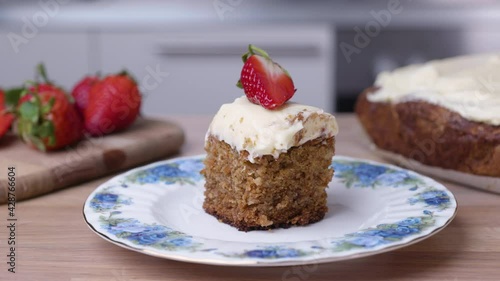 Wallpaper Mural Carrot Cake with Icing and Strawberry on a Porcelain Plate. - Slider Right  Torontodigital.ca