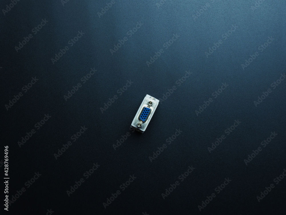 Fototapeta premium White dvi-vga connector on dark background.