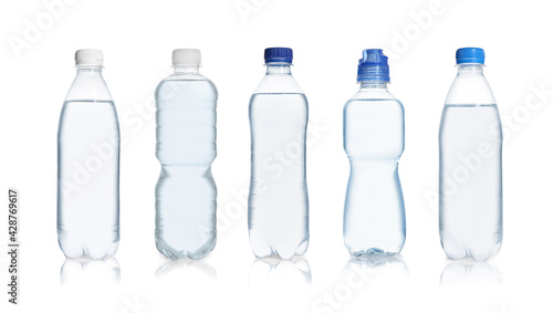 Set with different bottles of pure water on white background. Banner design