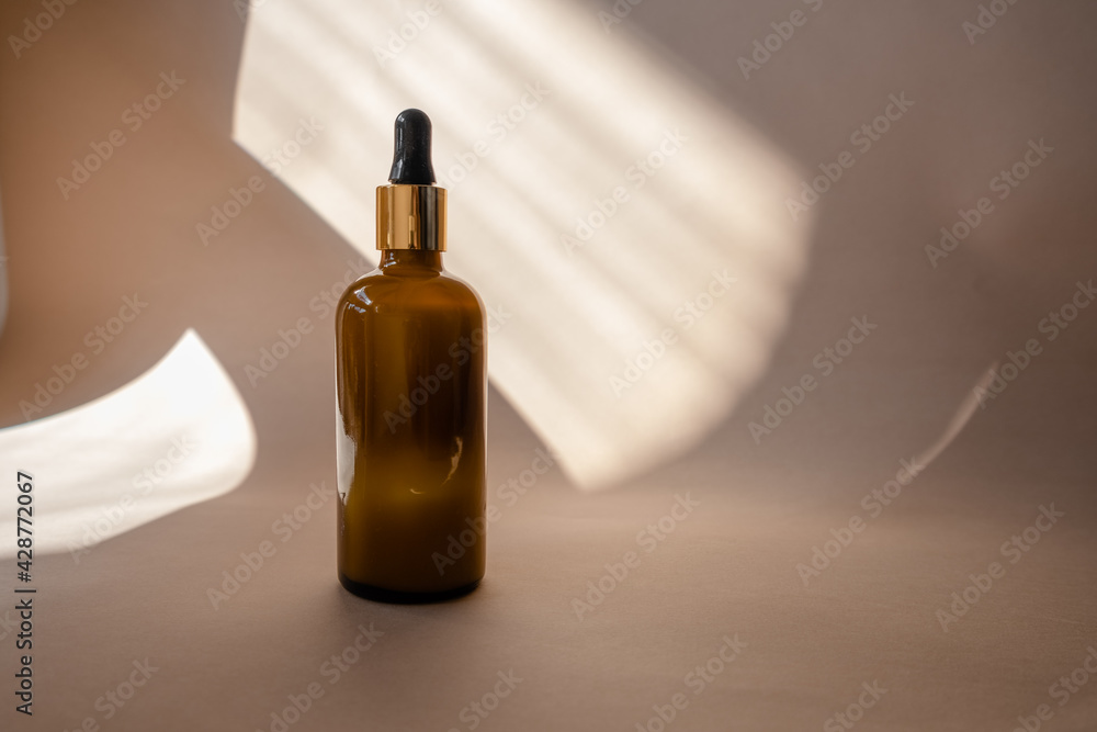 Eco Mineral oil in Amber glass bottles with pipette. Transparent hyaluronic serum gel and skin care concept. Top horizontal view copyspace of dropper glass.