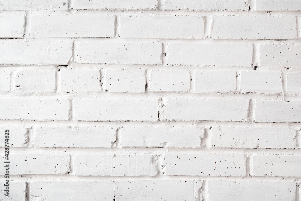 Obraz premium Brick wall painted with white paint