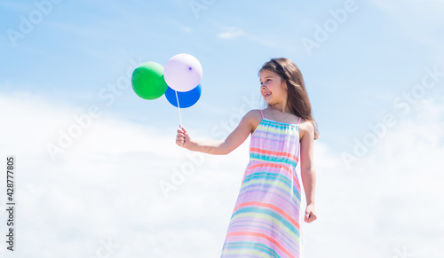 pretty teen girl with party balloons outdoor, party