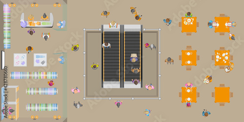 City mall. Escalator at the Mall with visitors. Clothing shop top view. Fashion, beauty, sale. 
Interior fashion store view from above.