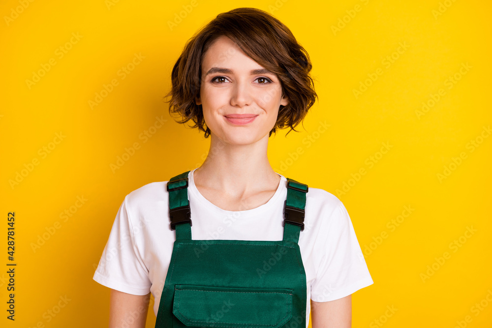 Portrait of nice hairstyle charming satisfied lady smile look camera isolated on yellow color background Portrait of nice hairstyle charming satisfied lady smile look camera isolated on yellow color background
