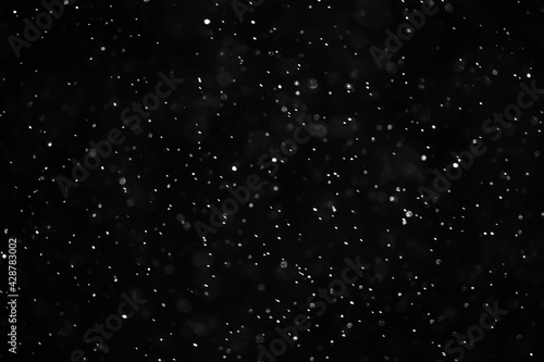 snow black background abstract texture, snowflakes falling in the sky overlay