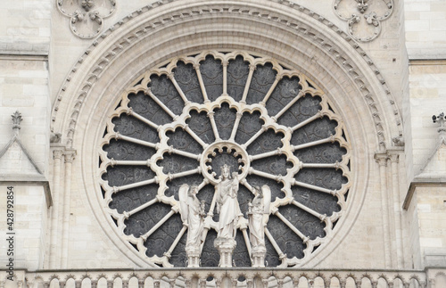 Cathedral crafting Jesus detail on central facade window 