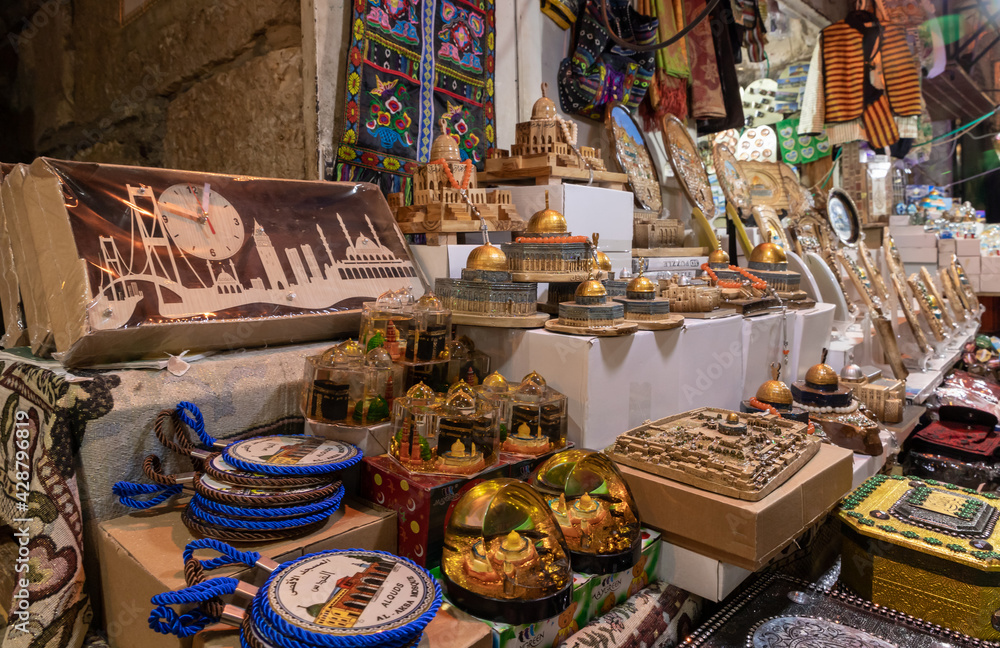 Counters with souvenirs in the market near the Cotton Gate from the Temple Mount, in the old city of Jerusalem, Israel Counters with souvenirs in the market near the Cotton Gate from the Temple Mount, in the old city of Jerusalem, Israel