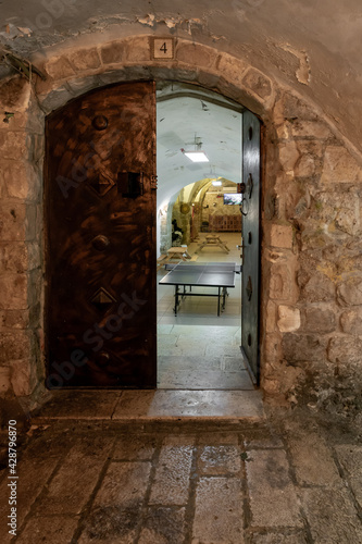The entrance  to a building with games in the Muslim Quarter near the exit from the Temple Mount - Chain Gate  in the old city of Jerusalem  in Israel