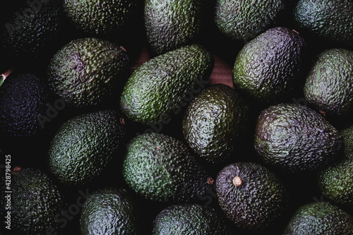High angle close up of freshly picked avocados.