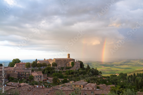 Rainbow over the hilltop town of Montalcino, Tuscany photo