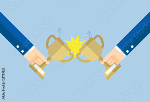 Business people celebrate receiving the winning trophy